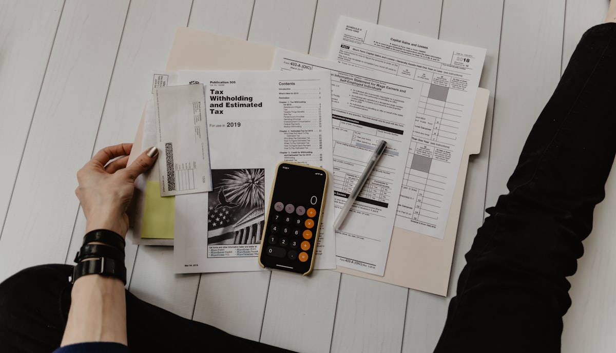 Business budget planning and pricing breakdown on paper